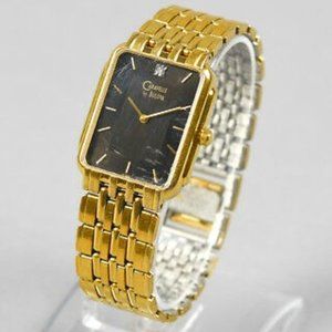 Vintage Caravelle by Bulova Diamond Quartz Gold Tone Tank Case Men's Watch